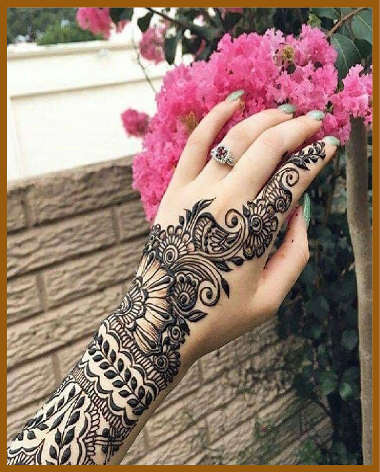 Elegant Back Hand Mehndi Design With Leaf Vines